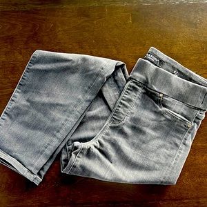 Black washed jean leggings with straight leg.